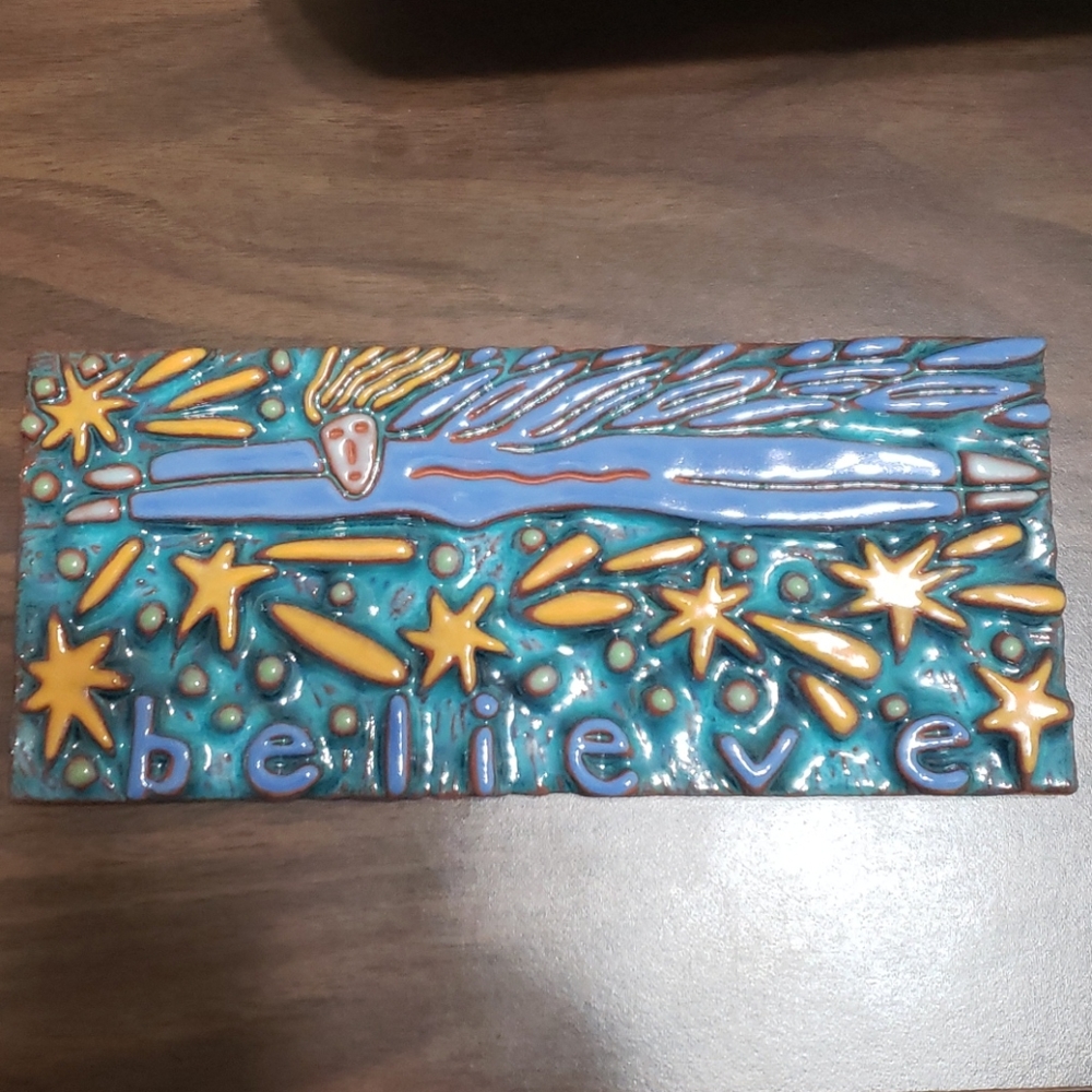 Believe ceramic wall hanging